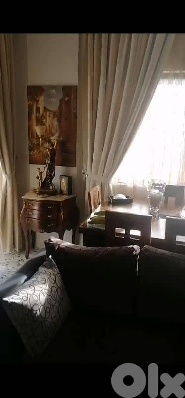 apartment For sale in amchit شقة للبيع في عمشيت 0