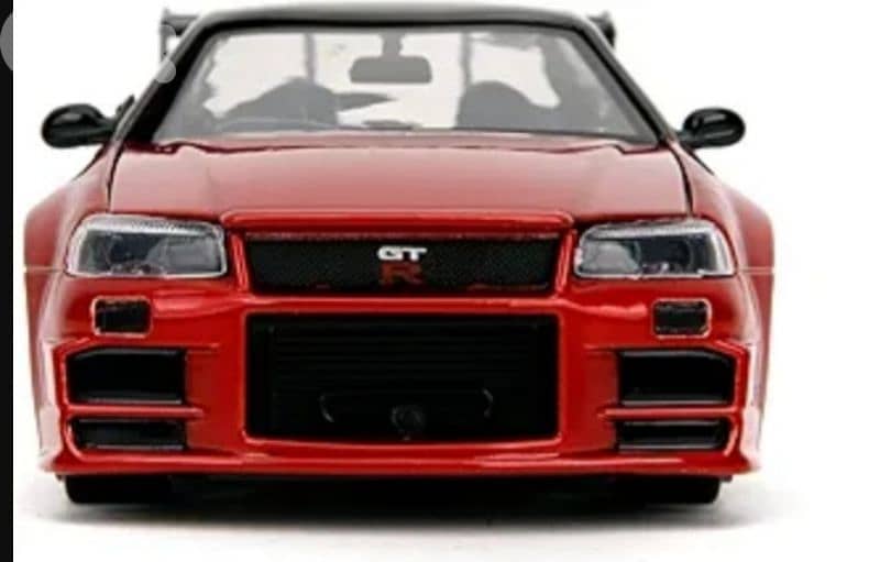 Nissan Skyline GT-R (R34) diecast car model 1:24. 2