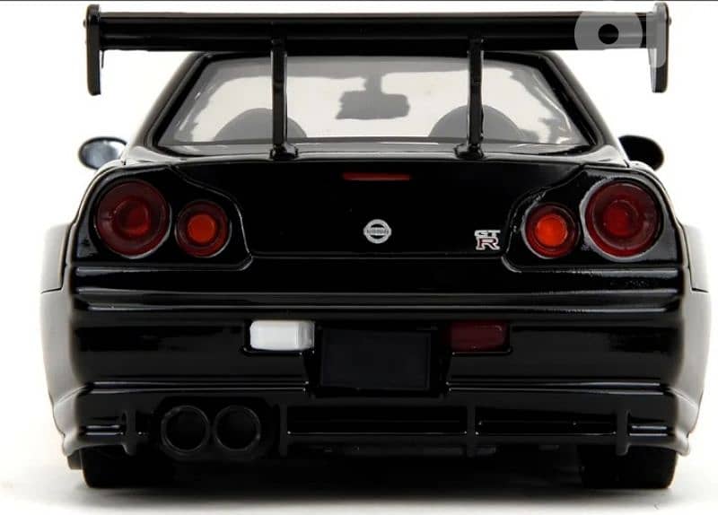Nissan Skyline GT-R (R34) diecast car model 1:24. 3