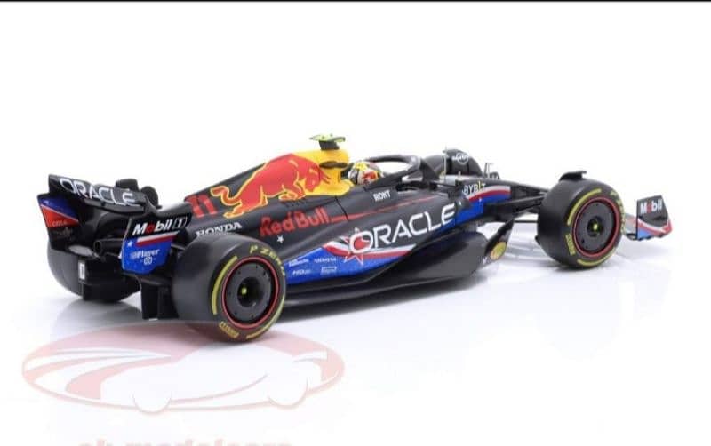 S. Perez Red Bull RB19 (GP USA 2023) diecast car model 1;18. 3