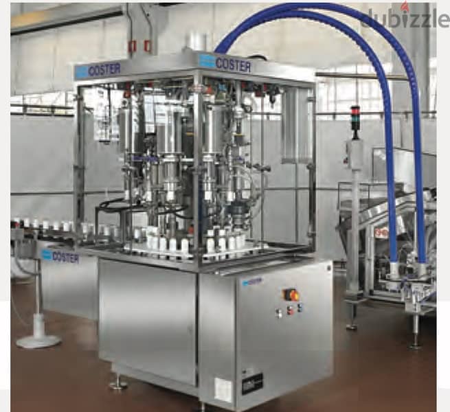 coster aerosol filling machine مكنة تعبئة غاز 0