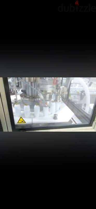 coster aerosol filling machine مكنة تعبئة غاز 1