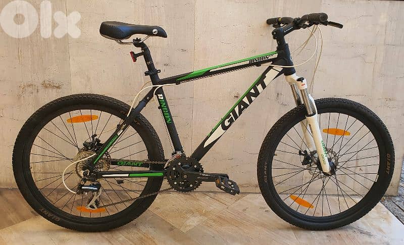 Giant Rincon Size M 3x8 speed disc brakes lockout suspension 0