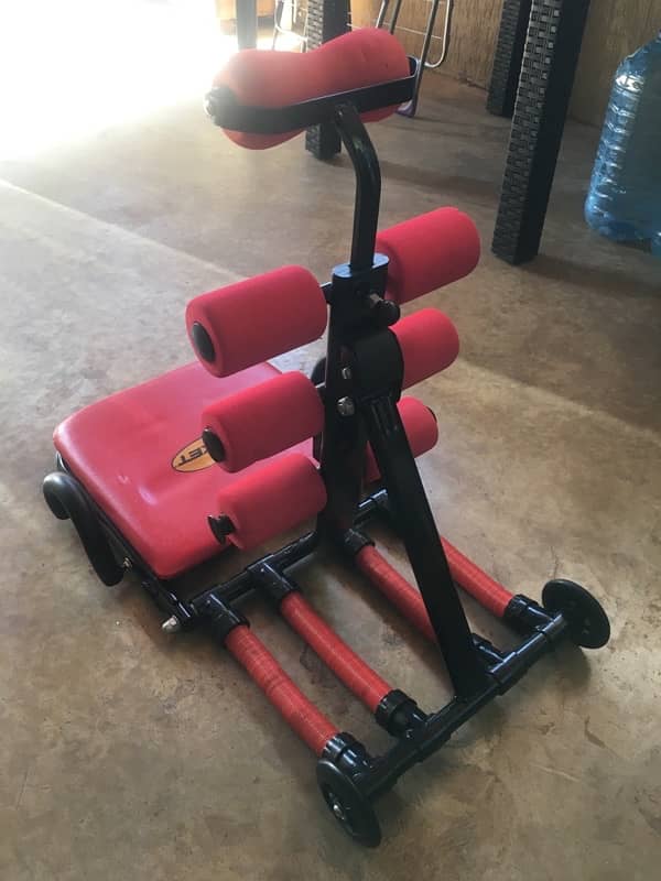 مكنة لتقوية عضلات الظهر و المعدة 2