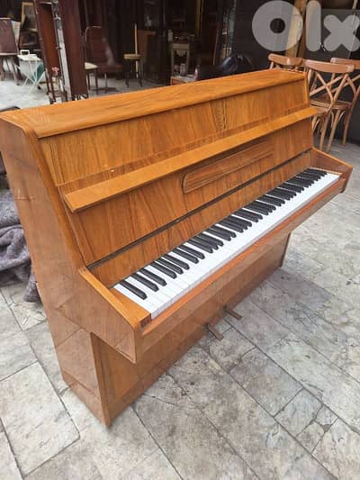 piano 7 octaves made in Germany tuning warranty