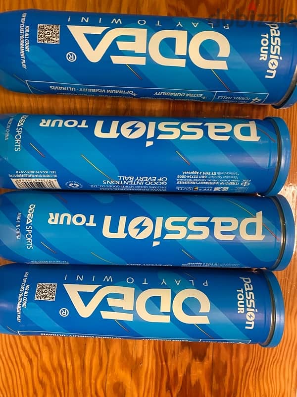 tennis grips , for 1$ each grip. each red odea ball coast 1$ 5