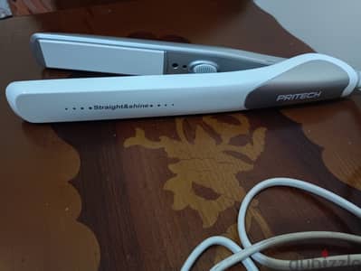 Hair straightener and free massager
