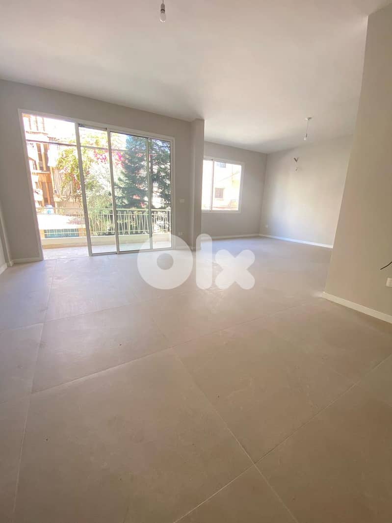 Renovated Modern Apartment 4 Sale in Ain el Remaneh - عين الرمانة 0