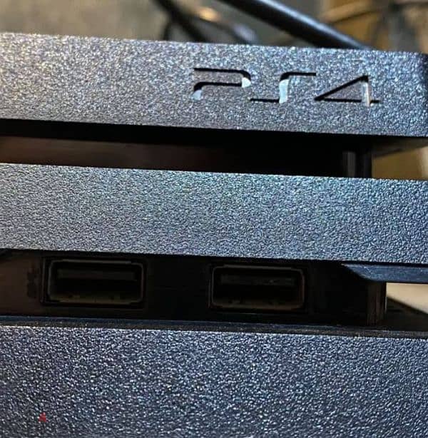 PS4 pro 1TB + 2 controllers + 6 games bundle 4