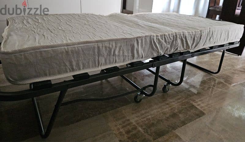 foldable bed - سرير قابل للطي 4