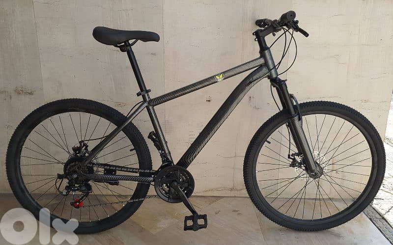 Carbon design carbon 26" disc brakes lockout suspension 21 speed 4