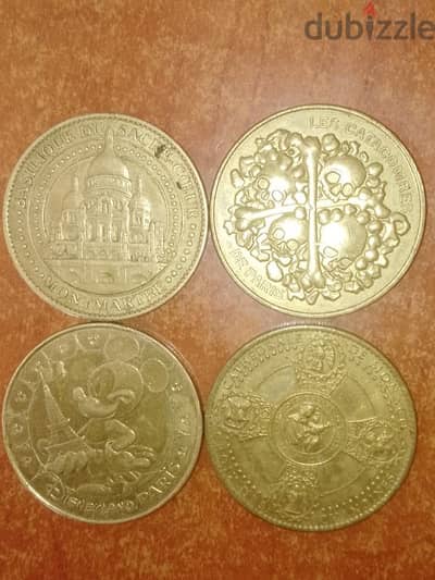 ميداليات عن كاتدرائيات الفرنسية و ديزني لاند