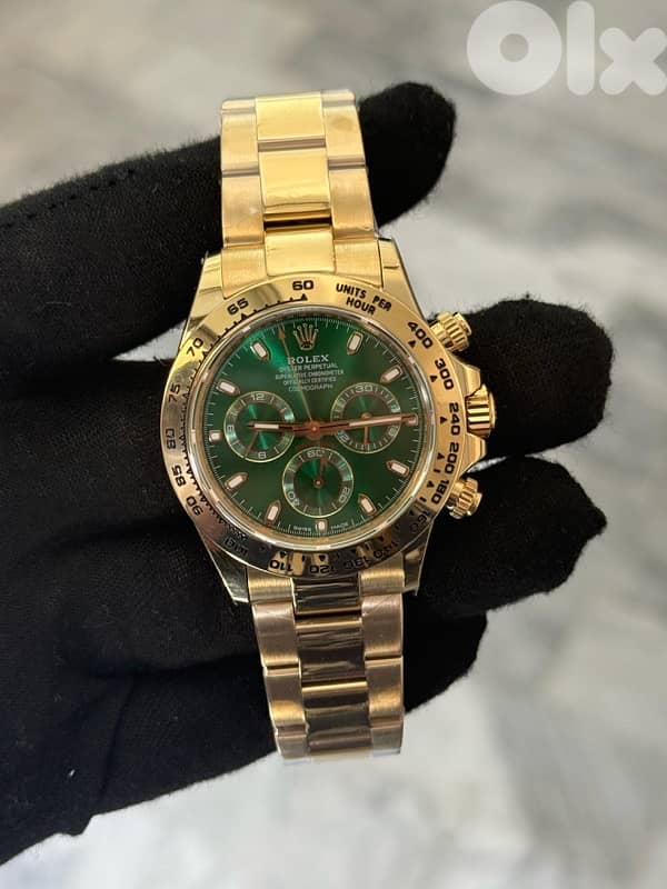 Rolex daytona gold 0