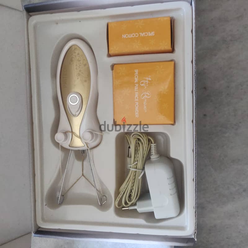 rechargeable hair removal new and a manual one 1