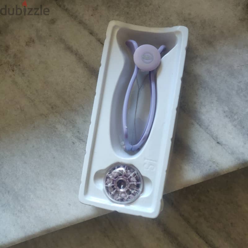 rechargeable hair removal new and a manual one 2