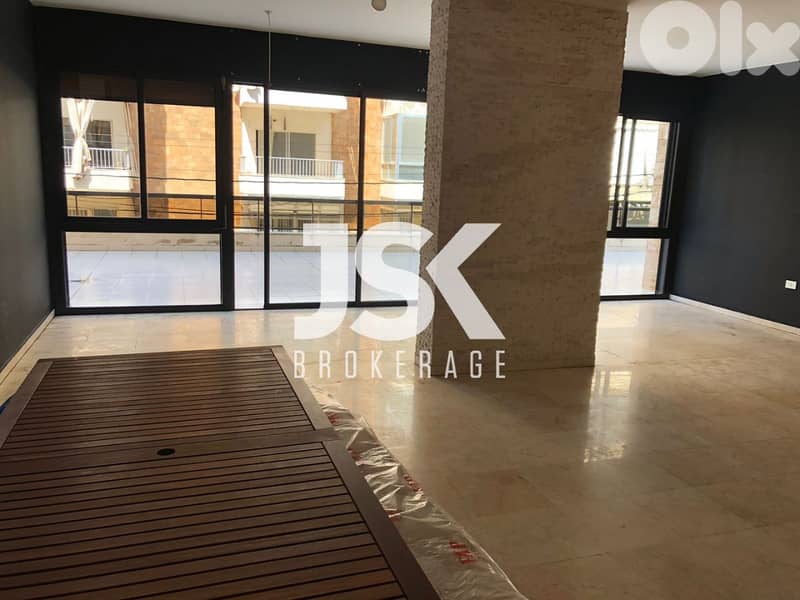 L12744-3-Bedroom Apartment With Terrace for Rent In Jal El Dib 0