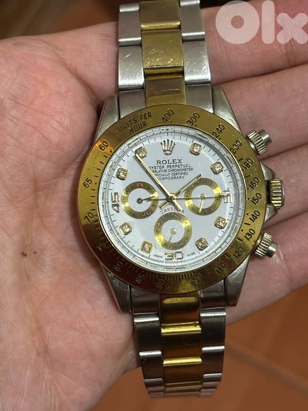 ROLEX AUTOMATIC AND MANUAL-WINDING OYSTER PERPETUAL DAYTONA 0