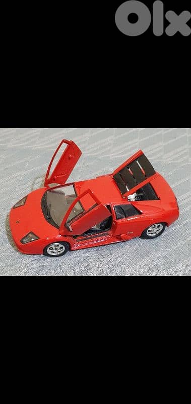 Red Lamborghini iron like new no scratches 1/24  only 17 $ b ashrafiye 5