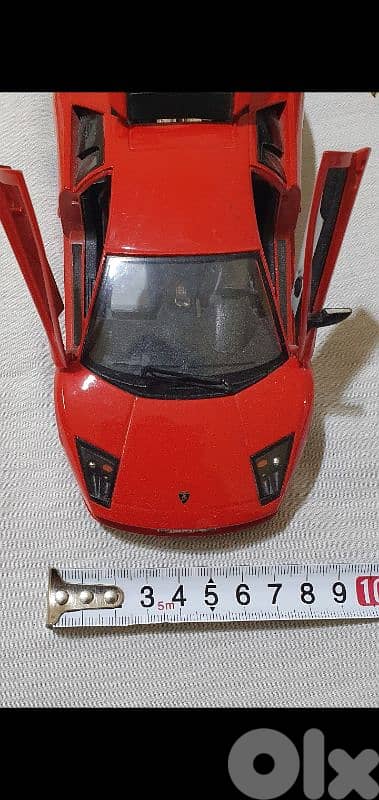 Red Lamborghini iron like new no scratches 1/24  only 17 $ b ashrafiye 6