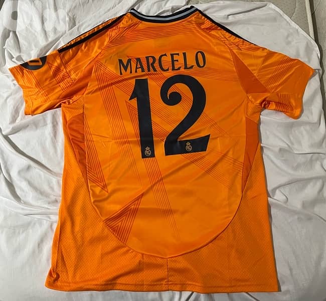 Real madrid away kit 24/25 Marcelo celebration 0