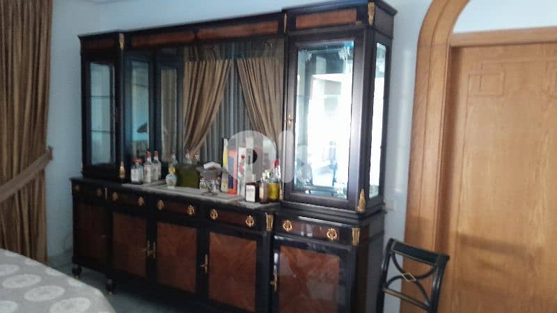 Dining room + couch + chandelier 1