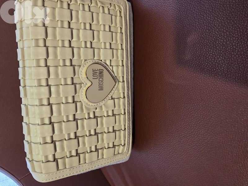 Original Bag love moschino worn once with small defect 0