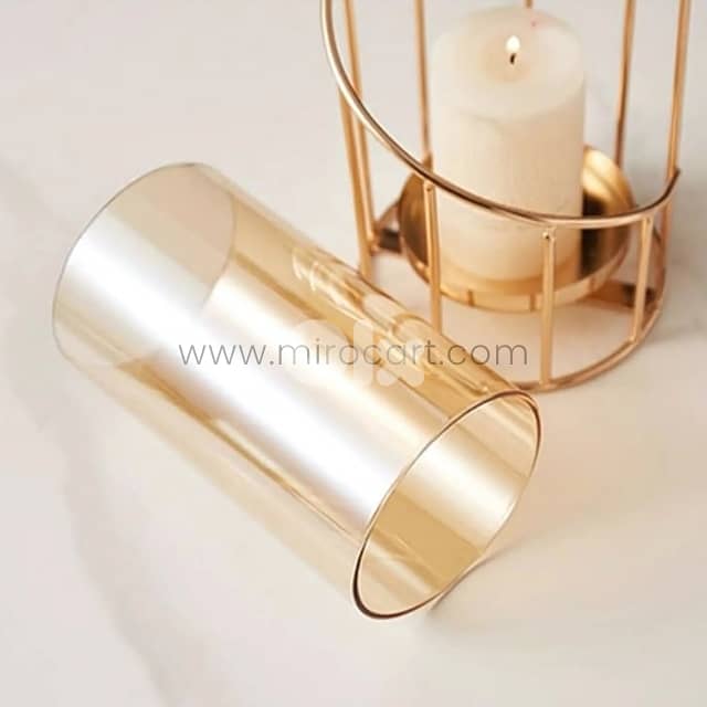 Golden Pillar Candle Holder – Spiral Metal Design with Windproof Glass 4