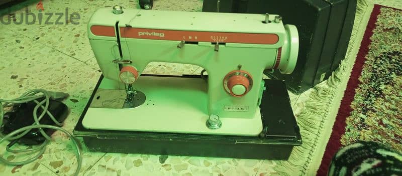 مكنة خياطة 0
