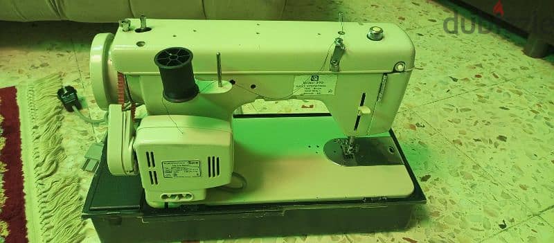 مكنة خياطة 1