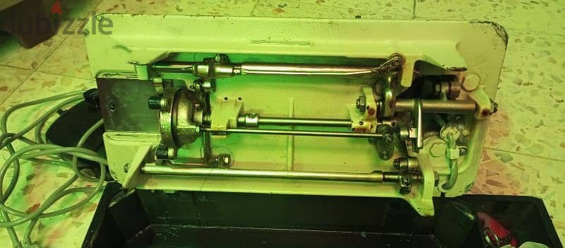 مكنة خياطة 3