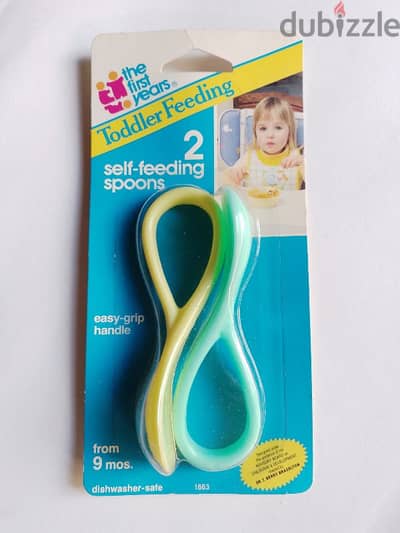 2 self - feeding spoons