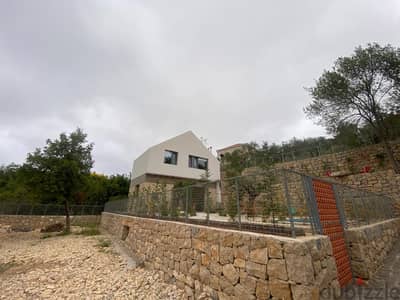 Land with a stand-alone house for sale in Mrah Chdidأرض مع منزل مستقل