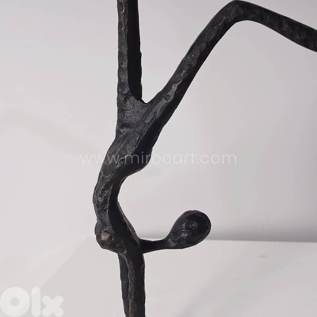 Stillness in Motion Sculpture – Abstract Black Metal Handstand Figure 4