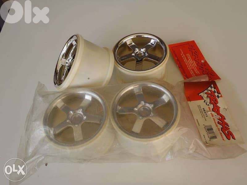 exchange on rc car ,TRAXXAS,CHROME RIMS,hurrican,3.8 inches 1