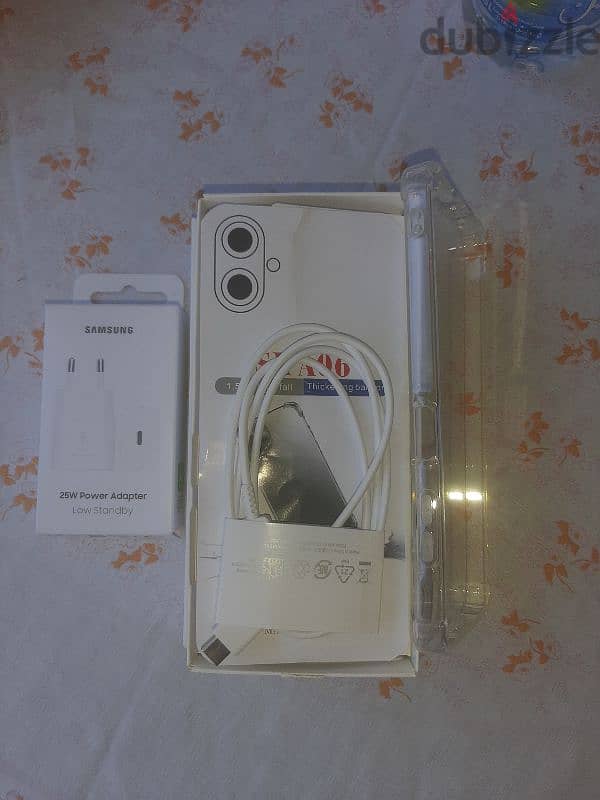 Samsung galaxy A06 brand new with cable , charger and protector 1