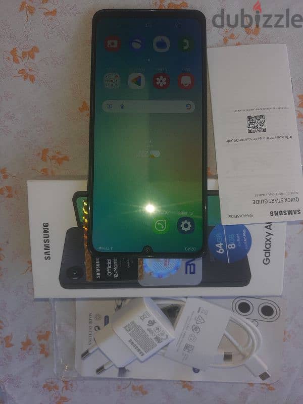 Samsung galaxy A06 brand new with cable , charger and protector 2
