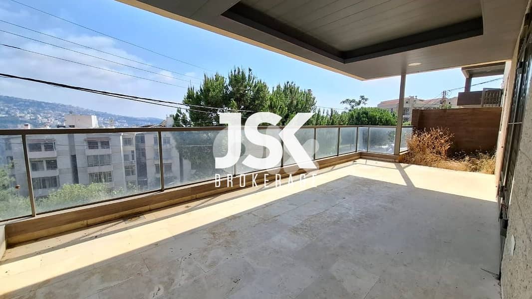 L18410-Spacious Apartment with Garden For Sale in Jeita 0