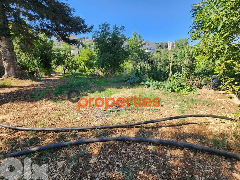 Land with an old stone house for sale in Kfardebian - CPKRH22 4