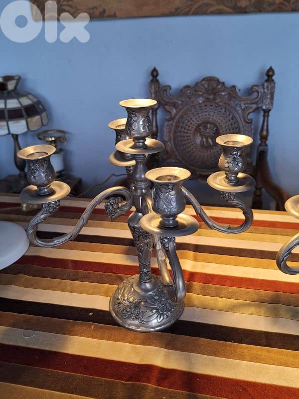 2 antique candle holders 2