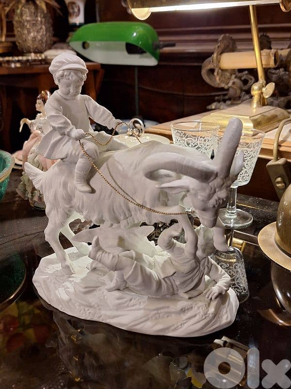 antique biscuit statue 0