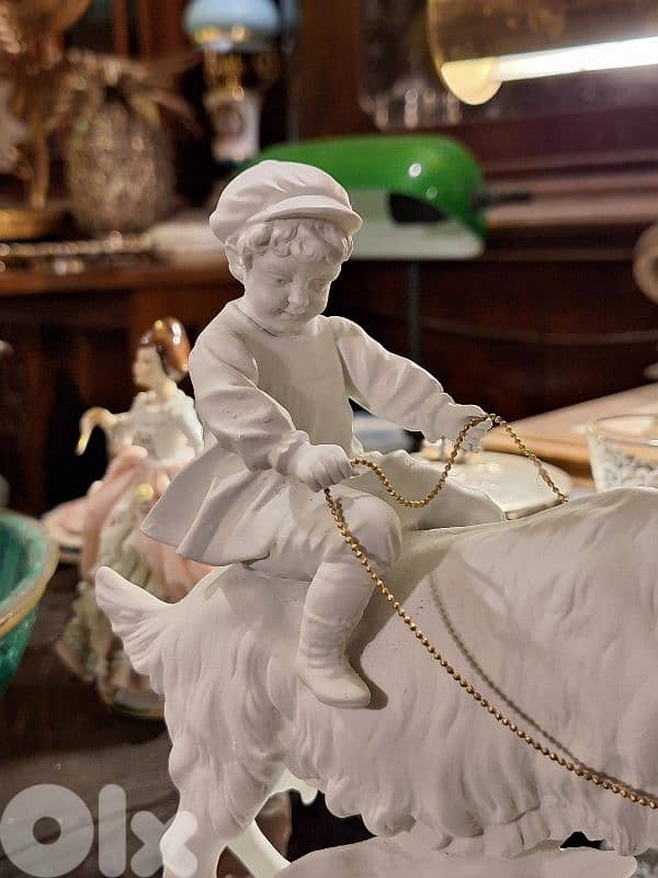 antique biscuit statue 2