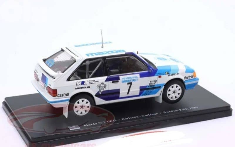Mazda 323 4WD (Rally Sweden 1989) diecast car model 1;24 3