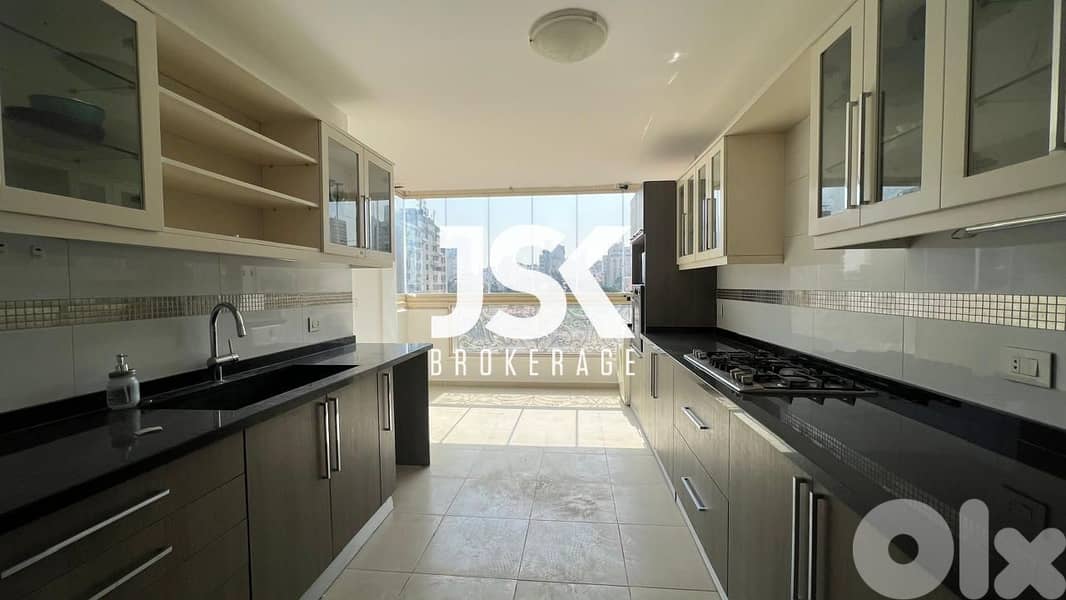 L15657-Bright & Sunny Apartment with City View For Sale in Achrafieh, 0