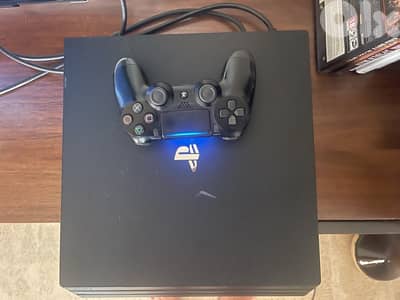 PS4 Pro 1 Terrabyte With 5 Games Original Controller