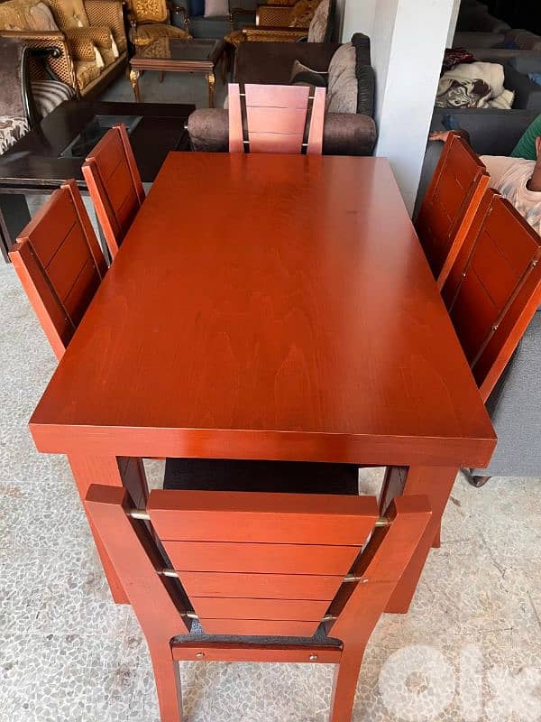 طاولة مع ست كراسي شغل توصاية ملبسة قشر 1