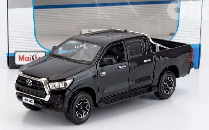Toyota Hilux 2021 diecast car model 1:27 0
