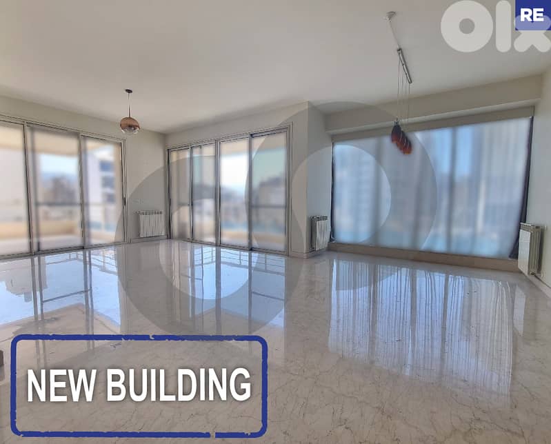 Spacious- apartment for rent- new building -Achrafieh REF#RE124662 0