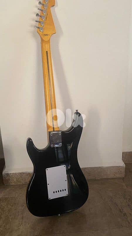 electric guitar with amp 2