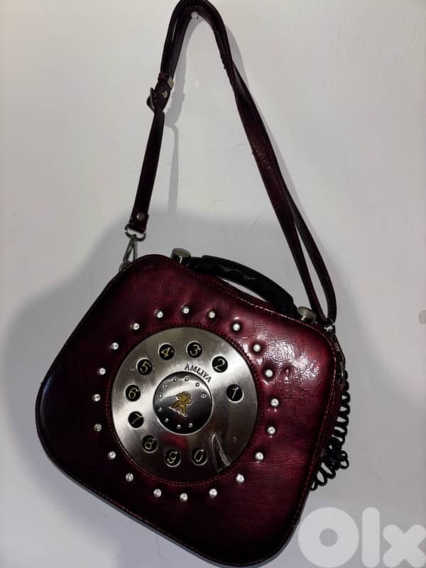 Burgundy Handbag In The Form Of Phone 0