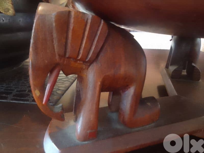100 years old wooden plate with elephants 1